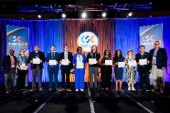 Travis Jarome on stage at CSC Convention honoring the Inclusion Fellowship.